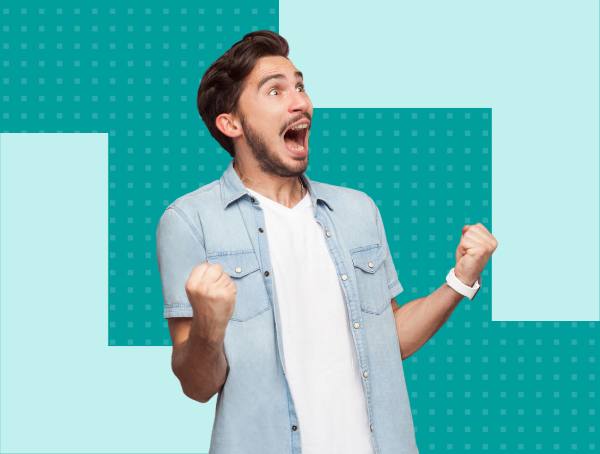 An excited man with clenched fists.