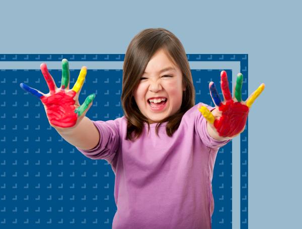 A little girl with finger paint