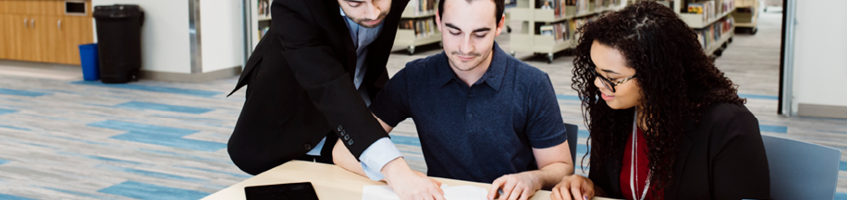 Three people consult over which business service would be best!